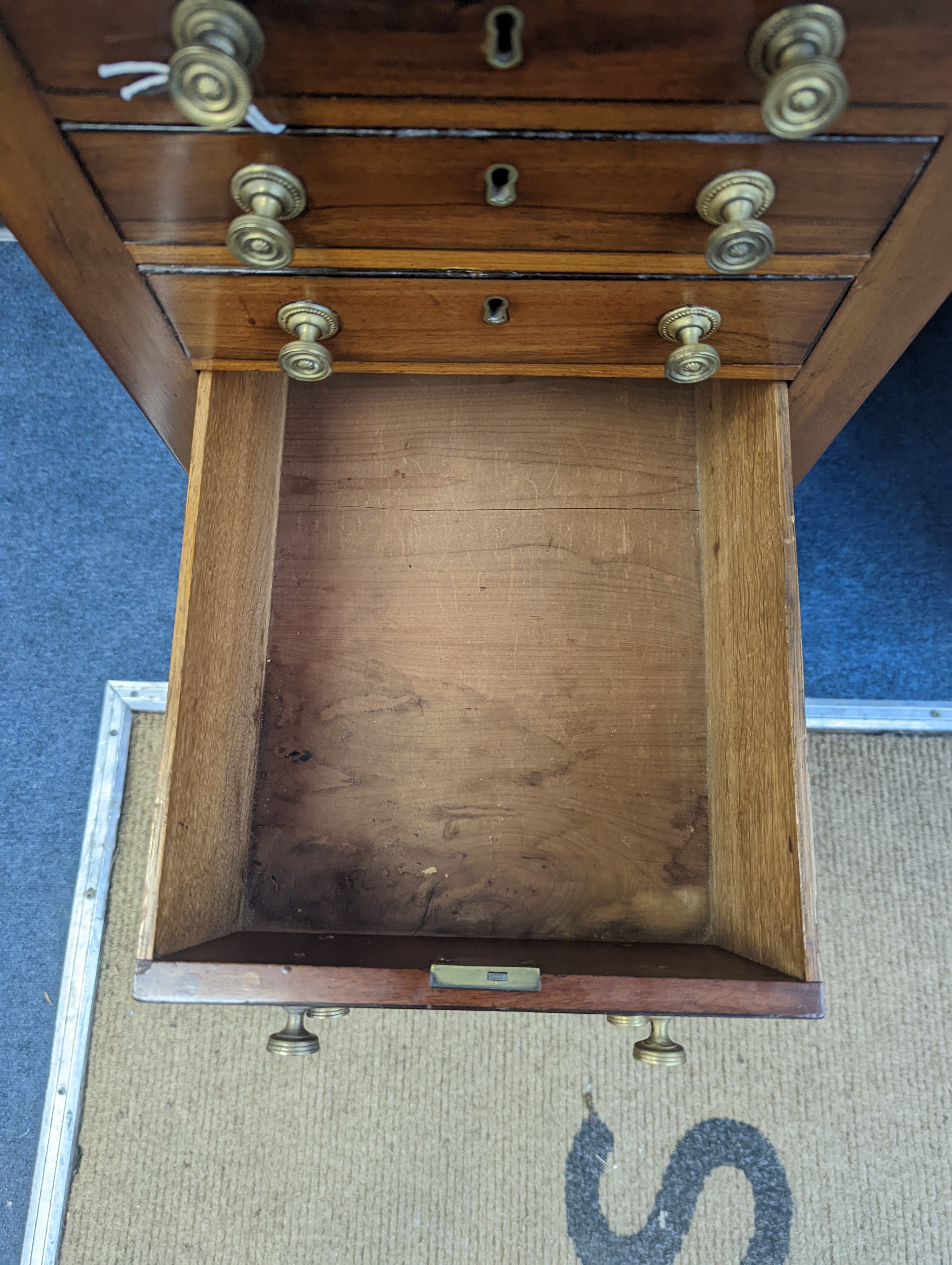 A Regency satinwood banded mahogany drop flap work table, width 69cm extended, depth 46cm, height 76cm